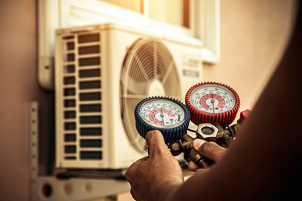 Professional Air Conditioning Service technician working in Feasterville Trevose, PA